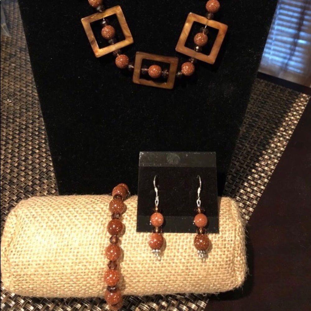 Matching necklace, earrings, and bracelet
